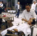 China Leshan street  barber.jpg (13815 bytes)