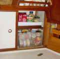 Galley locker with storage containers