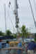 Main mast hanging from crane.jpg (15045 bytes)