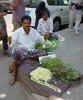 Yemen Aden vendor selling flower necklaces.jpg (27891 bytes)